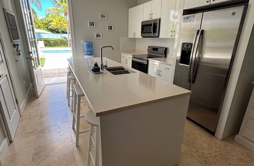 Palm Cay Condo | Breathtaking Pool Front 3-Bedroom Condo, Just 8-Min Walk to Pristine Beach!