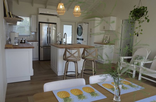 Great Exuma Villa | NEW 2 bdrm Sunrise Villa on 1+ acre tropical garden directly on Hoopers Beach